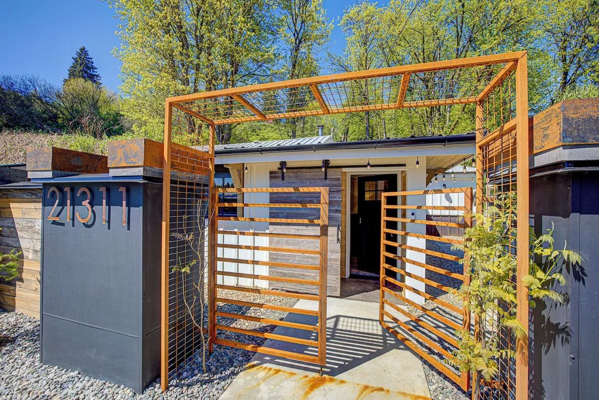 Weathering-steel entry arbor with double gates